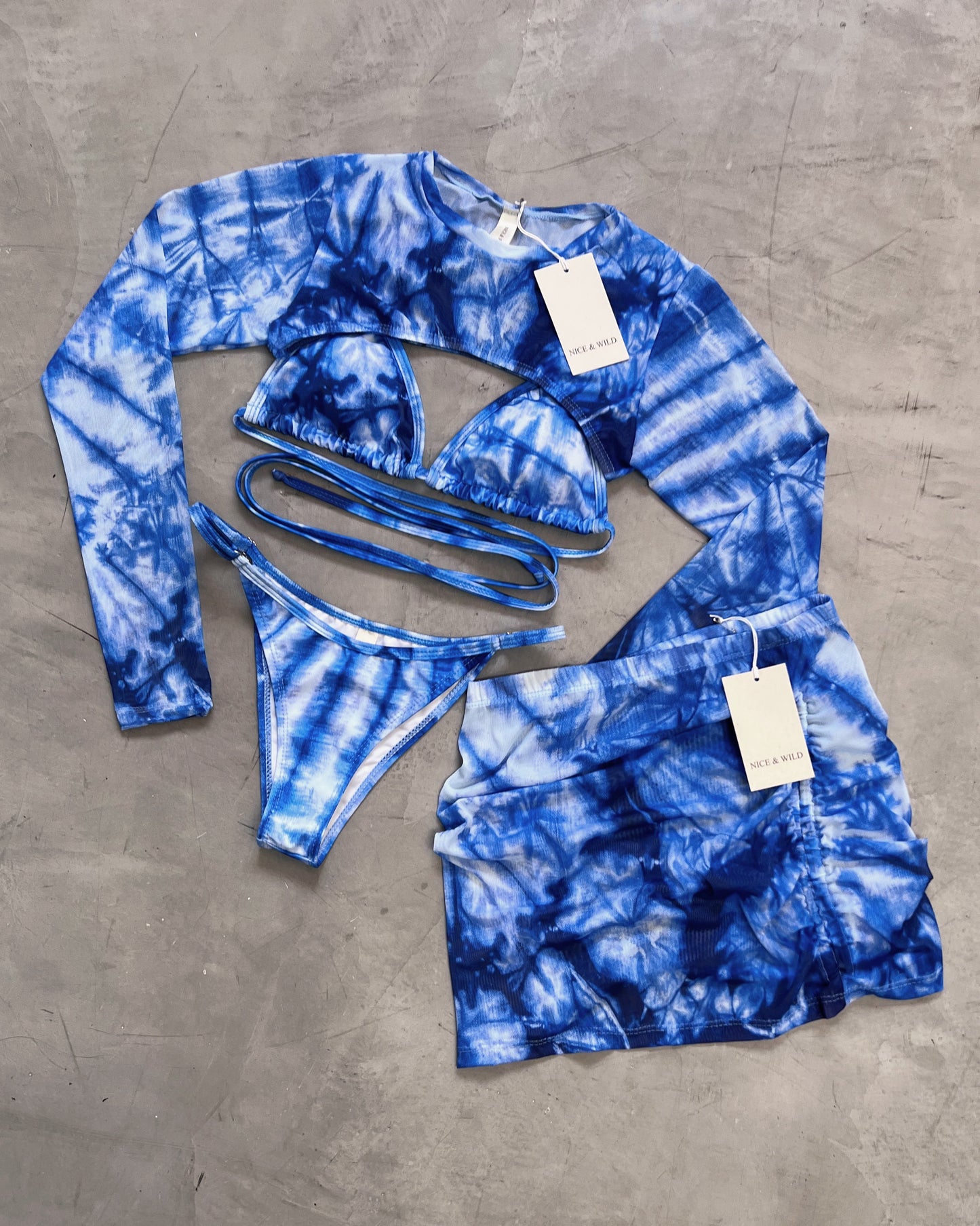 SET BIKINI VETEADO AZUL + FALDA EN MALLA