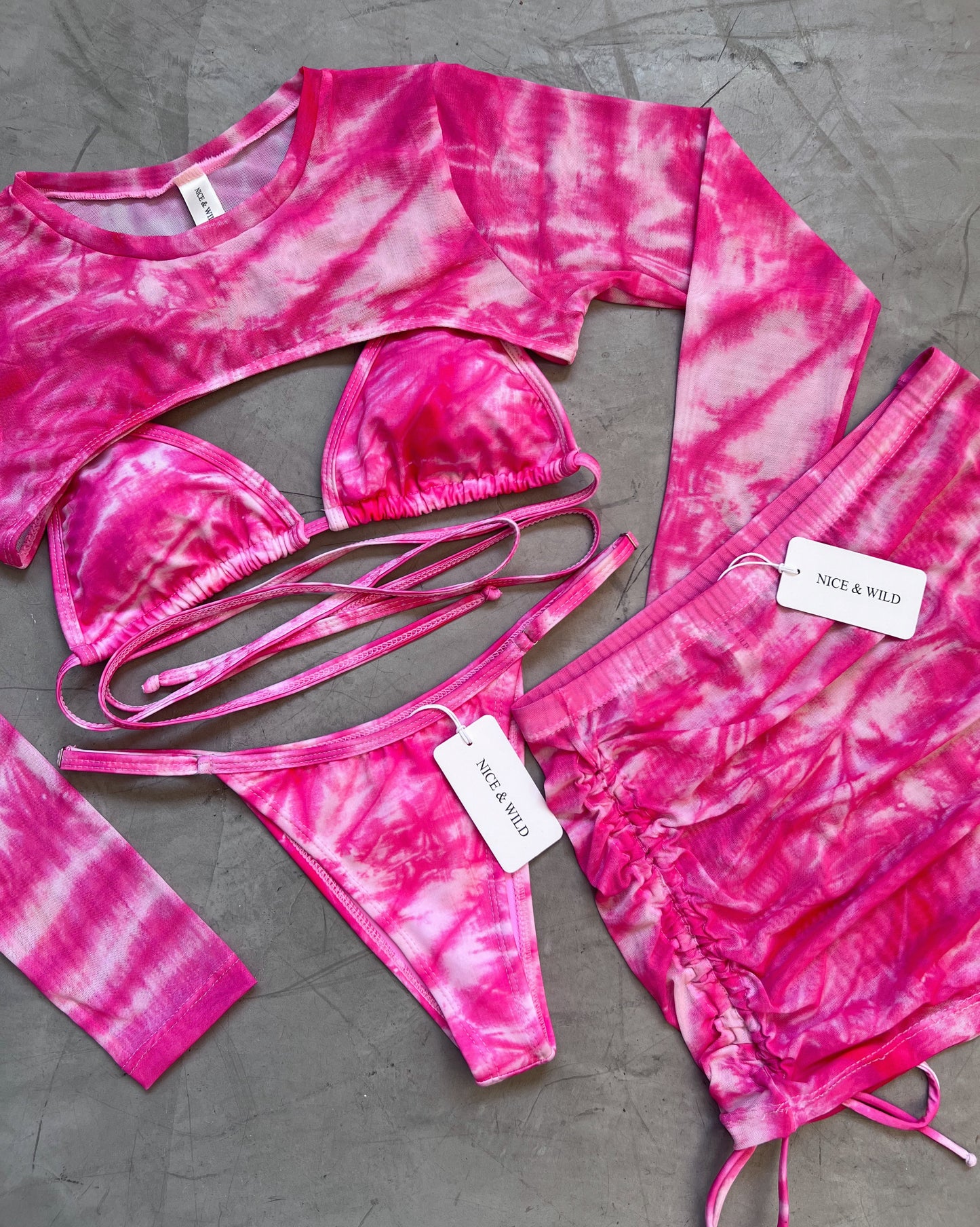 SET BIKINI VETEADO ROSADO + FALDA EN MALLA