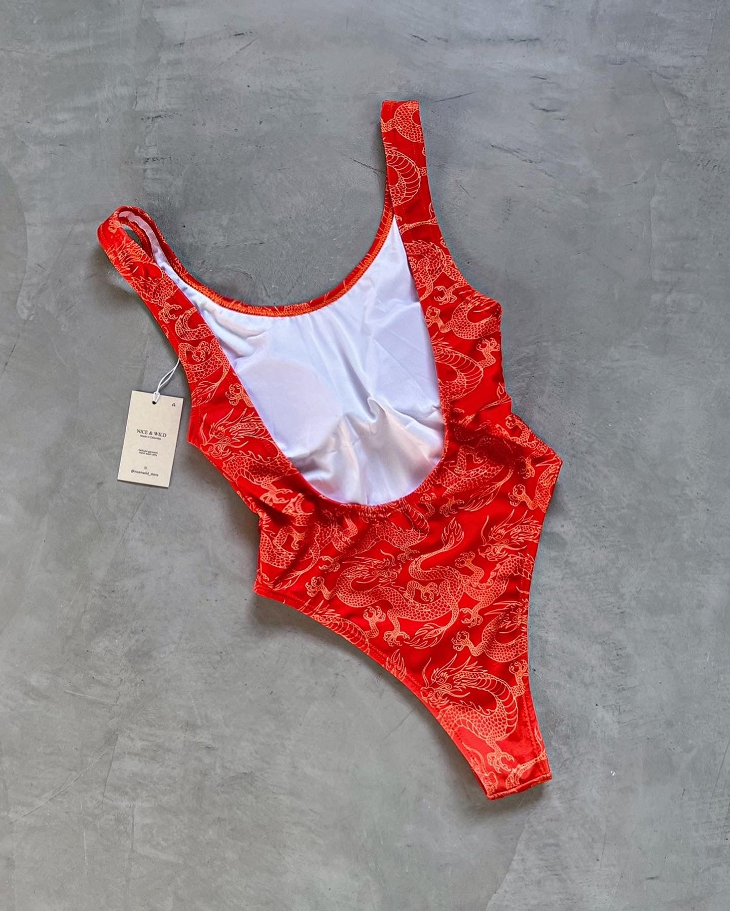 BODY BÁSICO DRAGONES NARANJA