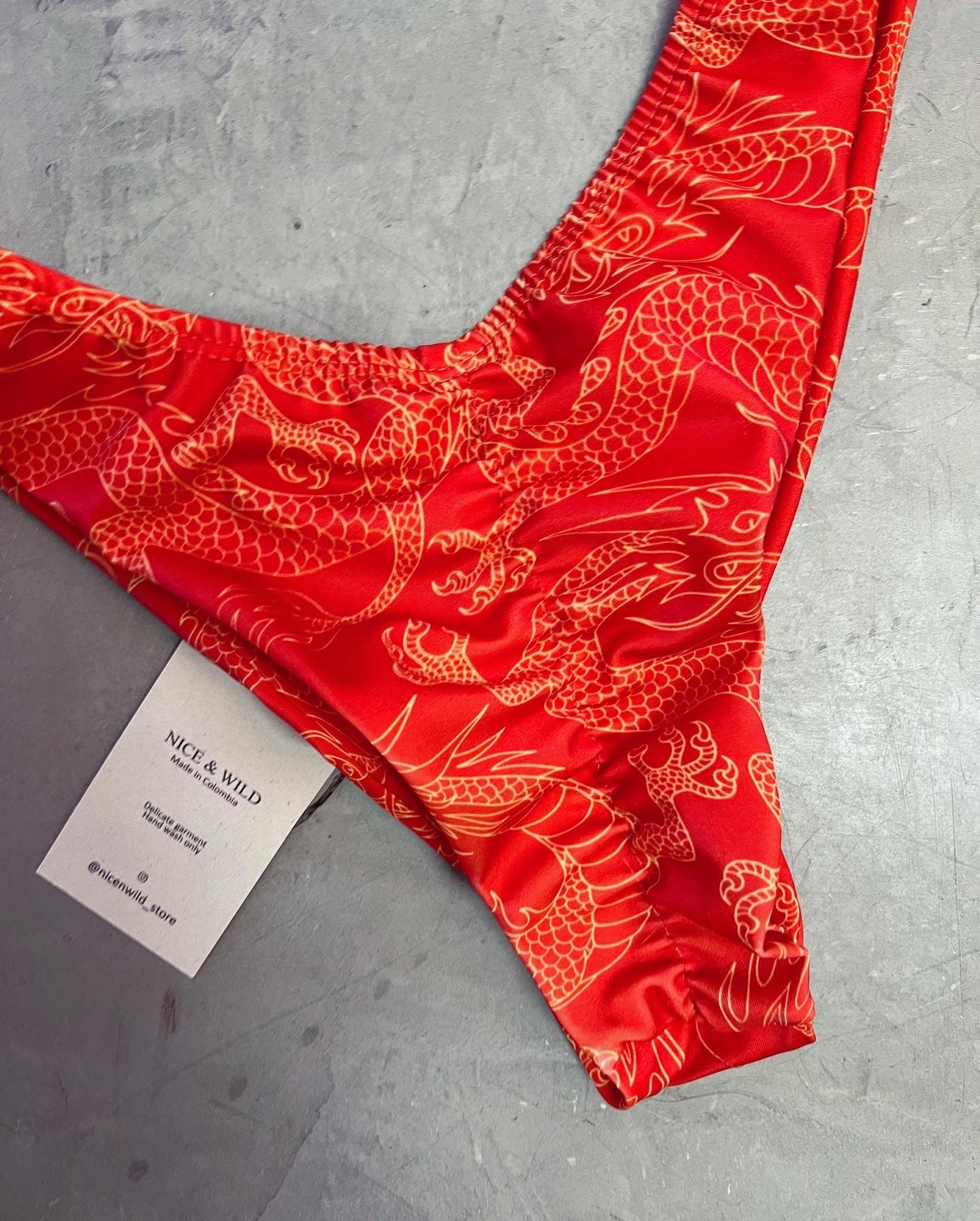 BIKINI CRUZADO DRAGONES NARANJA + FALDA EN MALLA