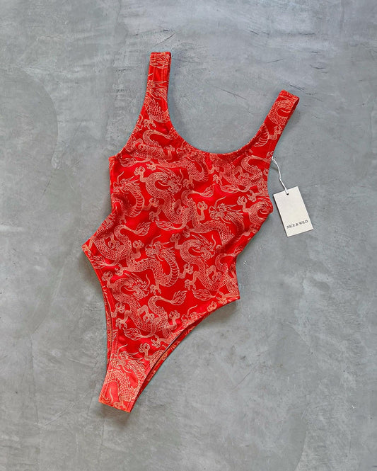 BODY BÁSICO DRAGONES NARANJA