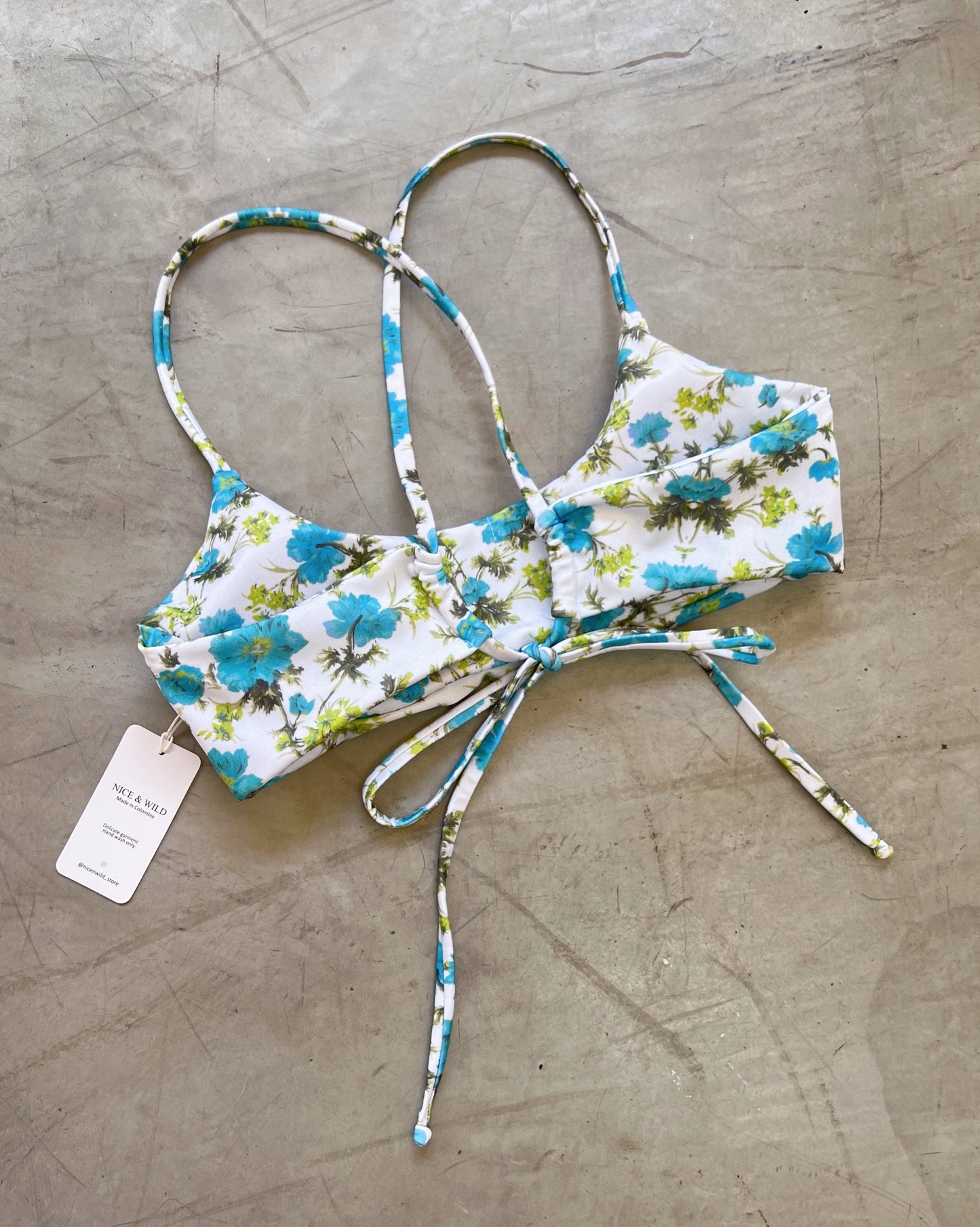 BIKINI CRUZADO FLORECITAS AZULES + FALDA EN MALLA