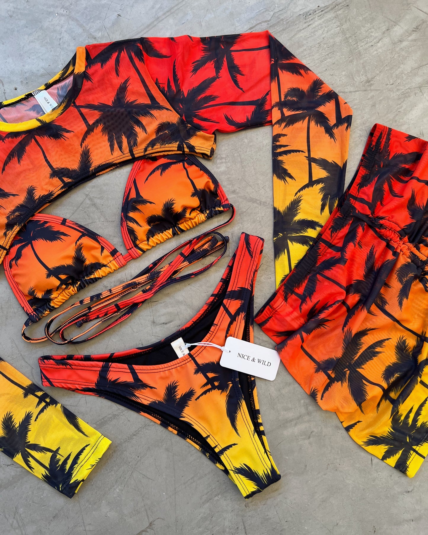 SET BIKINI PALMERAS NARANJA + FALDA EN MALLA