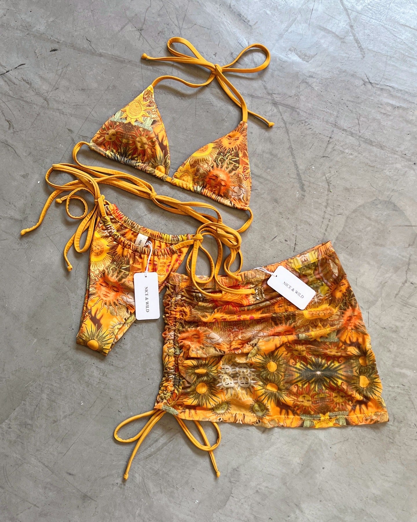 BIKINI BRONCEO SOLES + FALDA EN MALLA