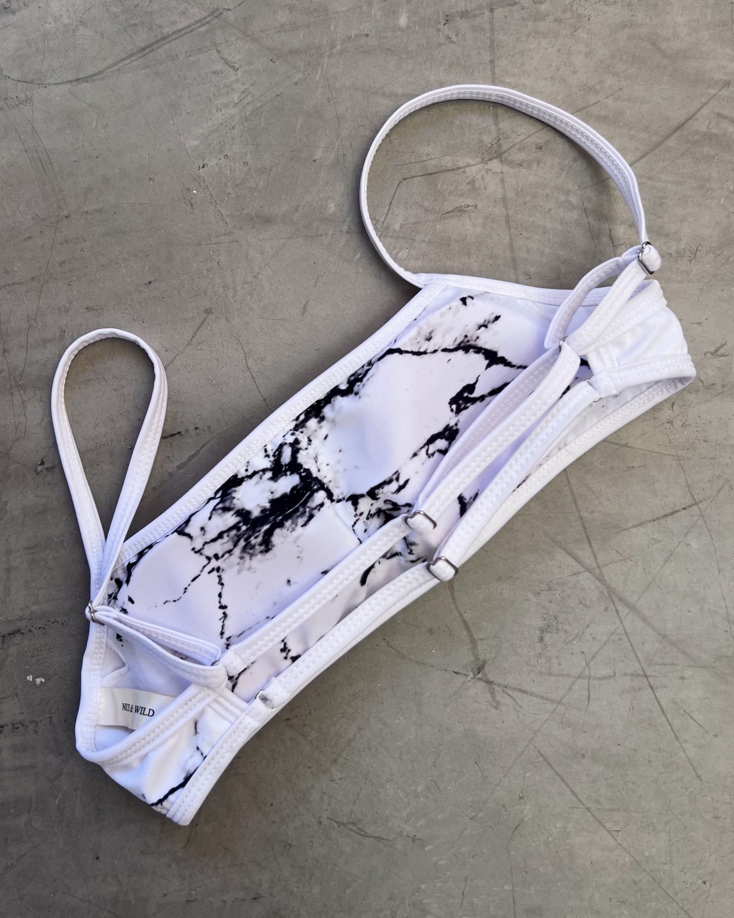 SET MIRANDA MARMOL BLANCO + FALDA EN MALLA