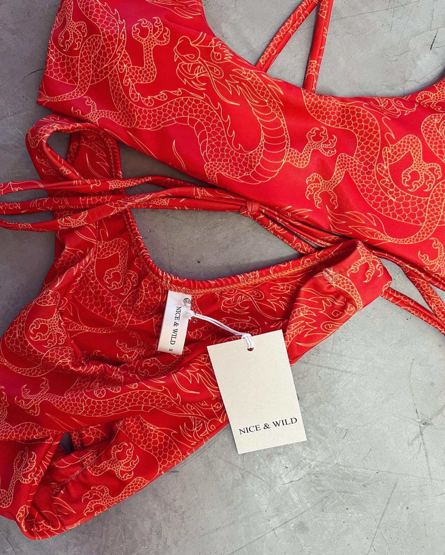 BIKINI CRUZADO DRAGONES NARANJA + FALDA EN MALLA