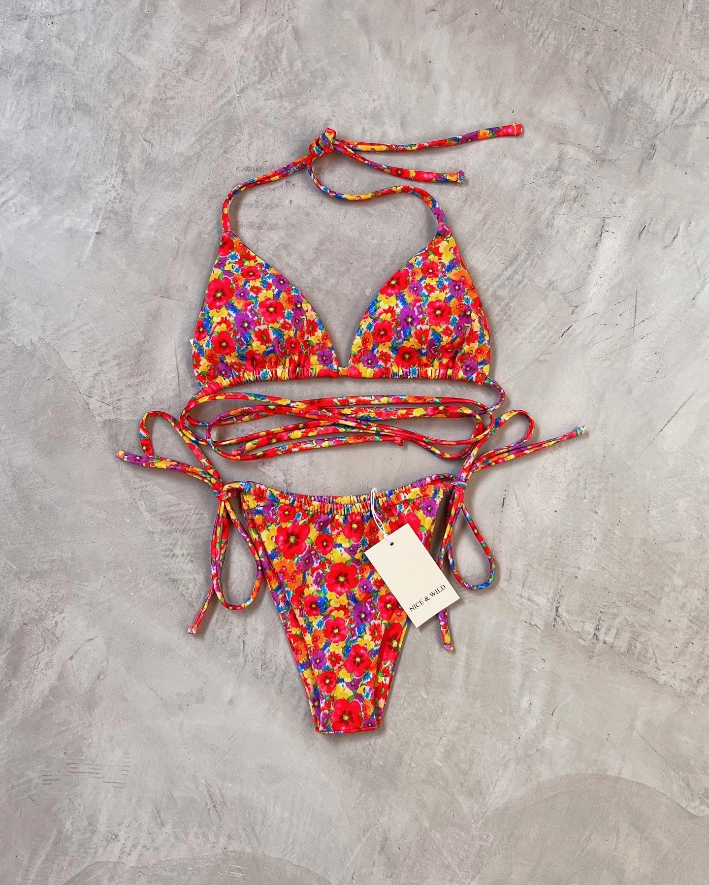 BIKINI BRONCEO FLORES COLORES + FALDA EN MALLA