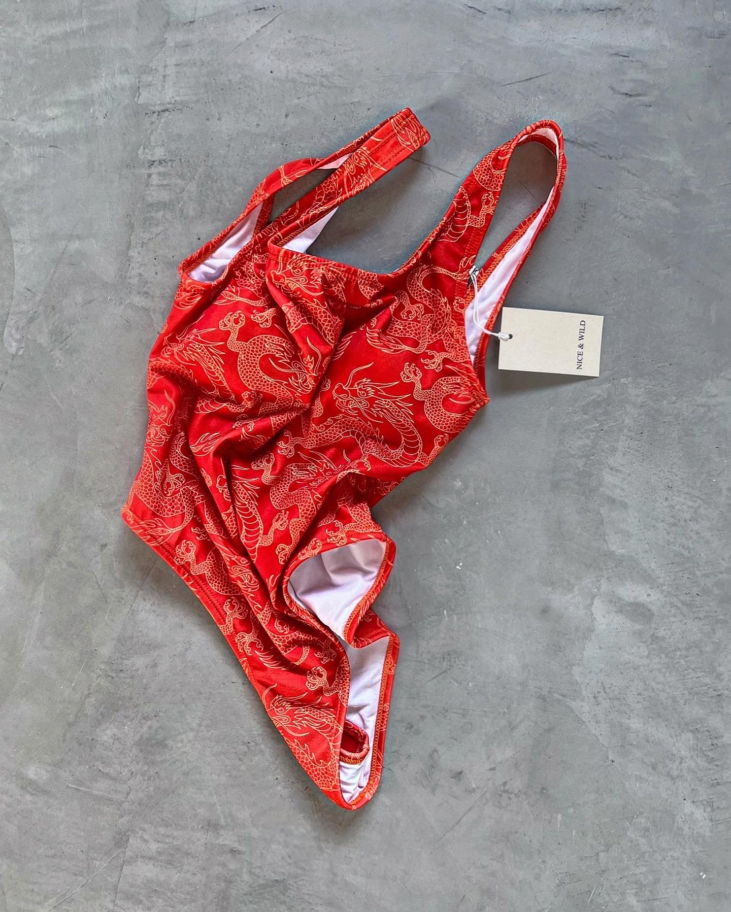 BODY BÁSICO DRAGONES NARANJA